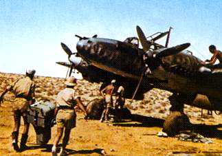Instalowanie kamery w samolocie rozpoznawczym Bf 110E-3